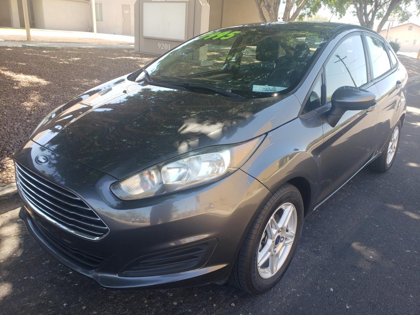 2019 /black Ford Fiesta SE (3FADP4BJ3KM) with an 1.6L L4 DOHC 16V engine, 6-Speed Automatic transmission, located at 323 E Dunlap Ave., Phoenix, AZ, 85020, (602) 331-9000, 33.567677, -112.069000 - 2019 Ford Fiesta SE,.....A Must See!!... No accidents,.... Ice cold AC. The car is gorgeous inside and out. Power windows, Power door locks, Stereo/ CD Player, Phone sync, Bluetooth, Backup camera, Beautiful Black interior with Black cloth seats in near perfect condition, Clean Arizona title , Runs - Photo#0